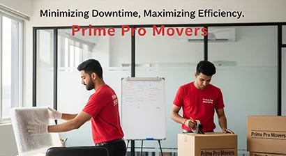 Movers packing office monitors and desk items during an office relocation in Gurugram